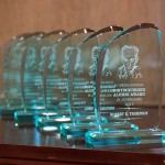 Glass trophies with an engraved image of Ernie Pyle were awarded to the recipients.
