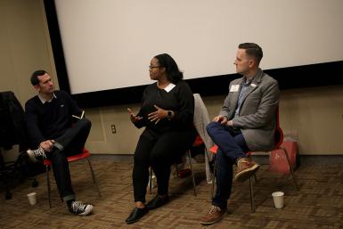 Media School alumni Robin Robinson, BA’07, and Greg Sorvig, BA’06, speak about programming film festivals as lecturer Craig Erpelding moderates.