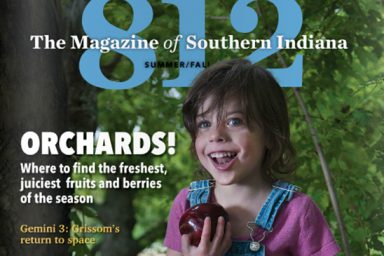 812 The Magazine cover featuring a young girl holding an apple