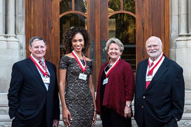 Distinguished Alumni Award winners (Left to right) Ed Spray, BS'63, MA'69; Sage Steele, BS'95; Diana Hadley, MA'80; and Craig Klugman, BA'67, stand on the steps of The Media School