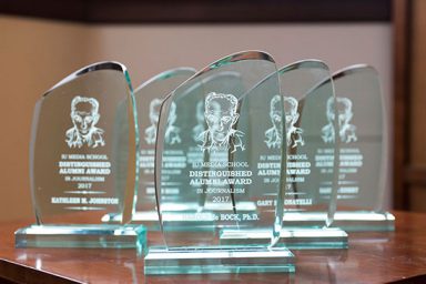 Distinguished Alumni Award glass trophies