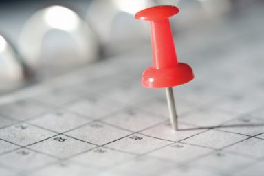 Pushpin on a calendar