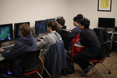 Students involved with Gaming@IU gather around computers