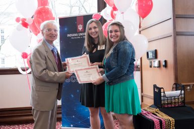 Professor Emeritus Cleve Wilhoit presented Kara Williams and Emerson Wolff with the Frances Wilhoit Research Paper Awards.