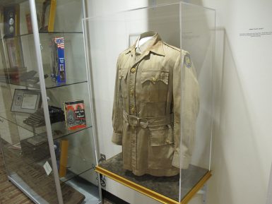 A jacket worn by journalist Ernie Pyle during World War II is on display with other artifacts in Franklin Hall.