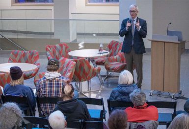 James Neff addresses the crowd during his presentation