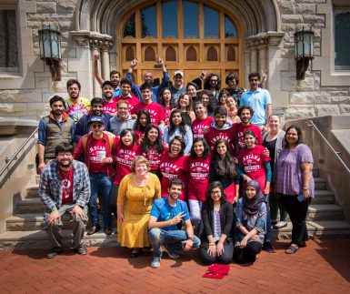 Students, faculty and staff involved in the Punjabi film project gather for a final photo outside Franklin Hall. (The Media School)