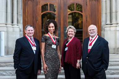 Ed Spray, BS'63, MA'69; Steele; Diana Hadley, MA'80; and Craig Klugman, BA'67, four of the six 2018 Distinguished Alumni Award recipients, pose in front of Franklin Hall. (Ann Schertz Photography)