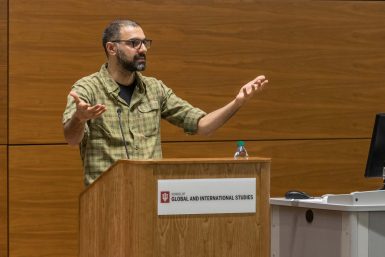 Aman Sethi speaks to a crowd at the School of Global and International Studies