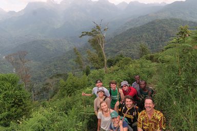 Jim Kelly and students on a mountain in Uganda