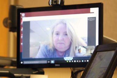 A woman on Skype on a computer screen