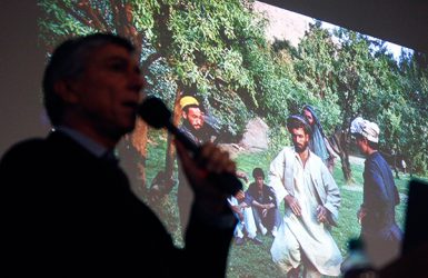 Nickelsberg's new book, Afghanistan: A Distant War, includes images he gathered during his years spent covering the region. He showed many to his audience as he discussed his work. (Caitlin O'Hara | The Media School)