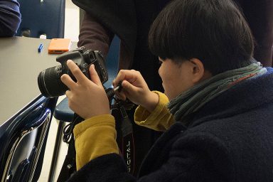 A student using a camera
