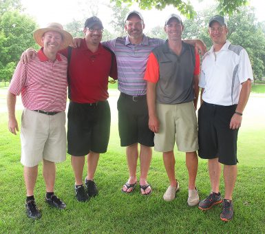 From left, John Schwarb, Tom Biersdorfer, JR Ross, Greg Bardonner and Brad Watts are among the friends who started the golf open in memory of their friend, John M. Jackson. (Audrie Osterman | The Media School)