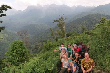 Jim Kelly and students on a mountain in Uganda