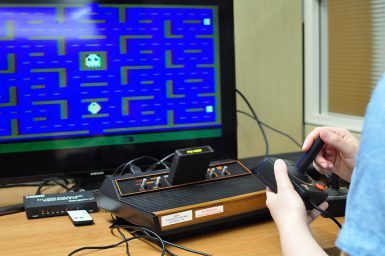 Students can use classic video game equipment in the lab in the Wells Library. (Michael Williams | The Media School)