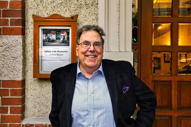 Professor emeritus Steve Raymer stands outside the Foreign Correspondents' Club in Hong Kong.