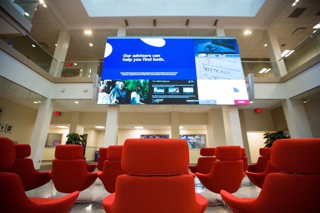 The digital screen in the Franklin Hall commons. It says: "Our advisors can help you find both."