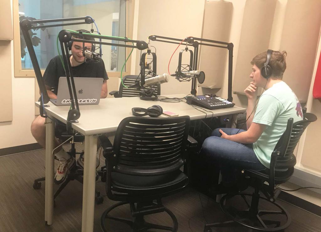 Zeke Shapiro, a freshman media major, records his WIUX podcast, "Zeke's Box Talk," with producer Tanner Chaille, a junior media major.