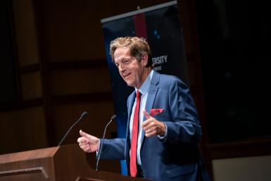 Craig Van Sickle speaking at a podium