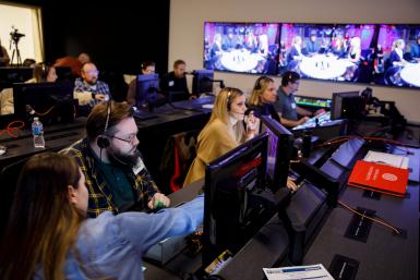 Team members from The Media School, CBS and IU Radio-Television Services work in the control room during the taping.