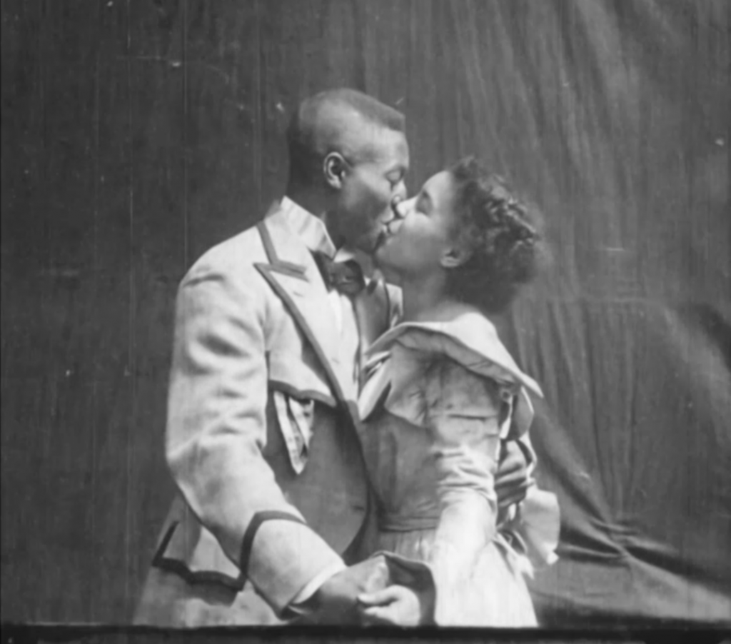 Two people kissing