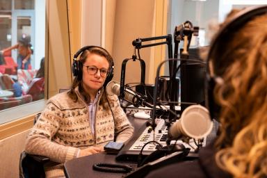 Emily Miles in the podcast booth