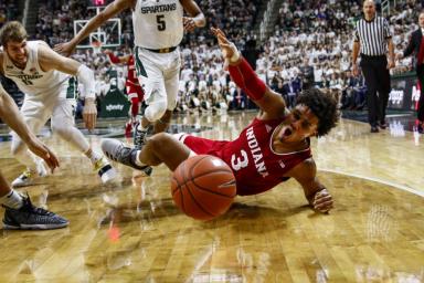 Sophomore forward Justin Smith loses the ball against Michigan State on Feb. 2 at Breslin Student Events Center in East Lansing, Michigan. Smith scored 13 in IU's 79-75 win over MSU.