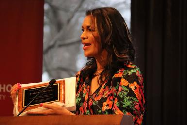 Fredricka Whitfield holding the Hamilton Award