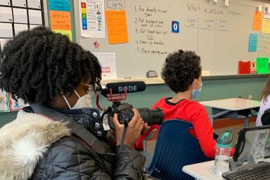 Ce'Aira Waymon films students at Fairview Elementary School