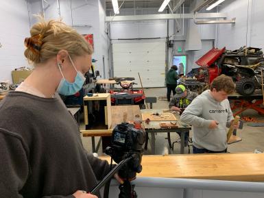 Grace Fox films the construction of the Dog Distractor at Hoosier Hills Career Center