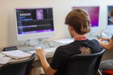 A student using a computer.