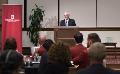 Brian H. Horton speaks at a podium during the DAA ceremony.