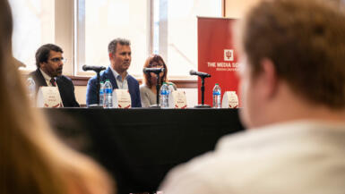 (Left to right) Steve Berkowitz of USA Today, T.J. Quinn of ESPN, and Jill Riepenhoff of Gray Television/InvestigateTV speak during the Investigative Journalism in Sports panel during the Arnolt Center for Investigative Journalism Symposium.