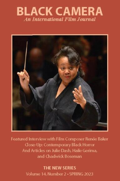 The front cover of the 2023 issue of Black Camera features a woman conducted music