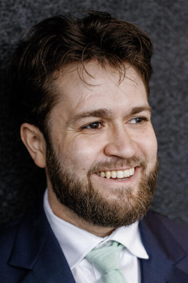 Headshot of James Benedict. 