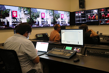 Faculty working in the Ed Spray Control Room.