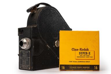 A 16mm camera and film roll.
