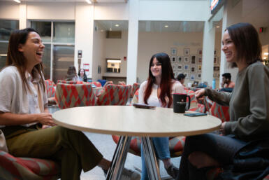 Sarah Boyd and Catt Sadler sit in the Franklin Hall Commons for an interview.