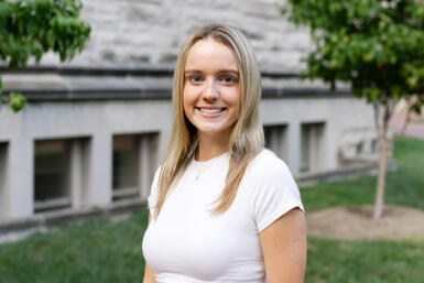 Headshot of Molly Sawyer standing outside.