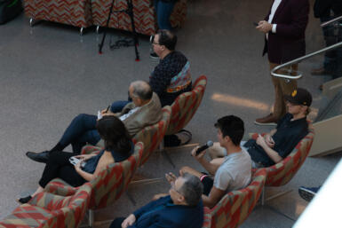 Young man in audience asks Miley a question during the Q&A portion of the event.