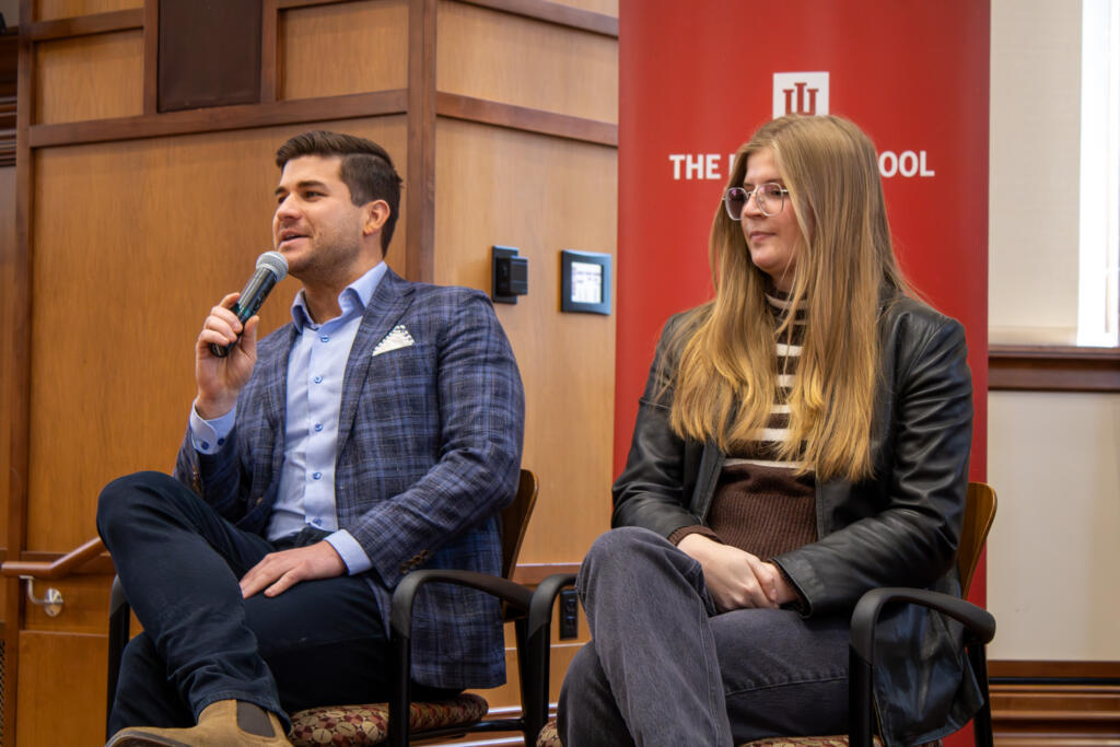 Griffin Gonzalez and Kaitlin Harris sit in chairs.