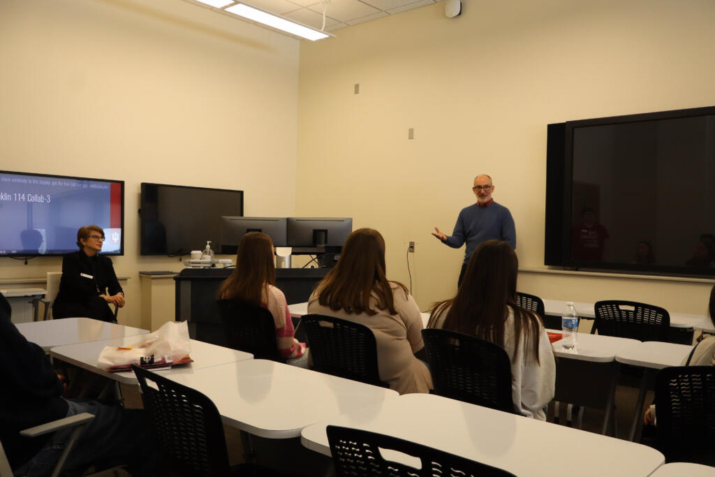 Dave Groobert and Bonnie Layton address students in a classroom.