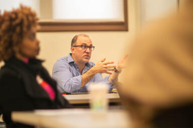 Attendees of the event engaging in discussion.