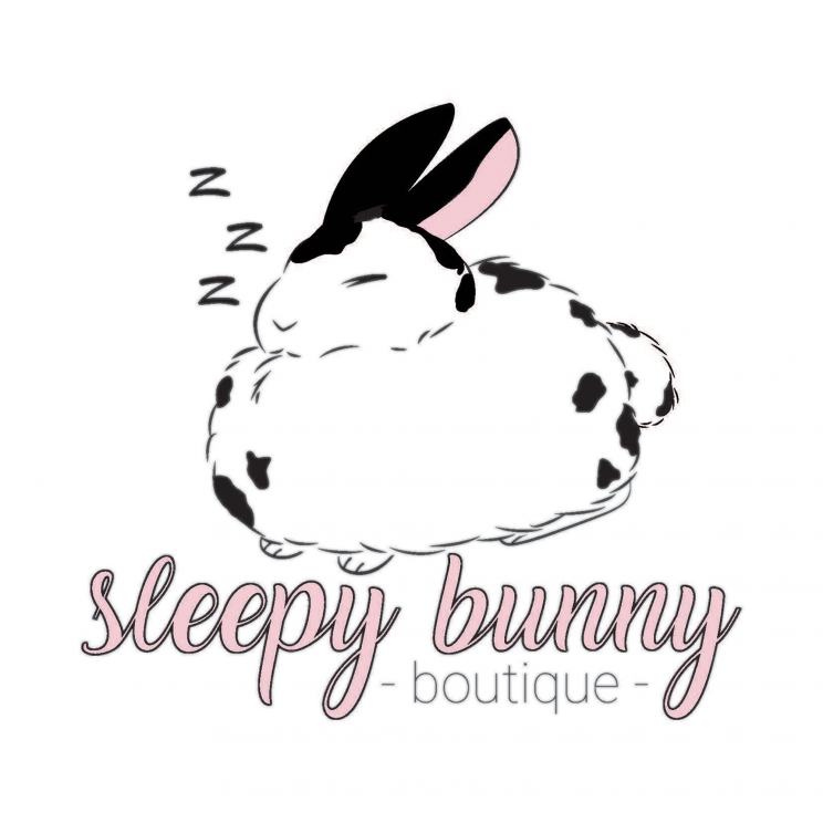 An illustration of a sleeping rabbit with the words, "Sleepy Bunny Boutique"