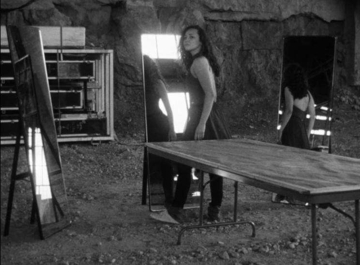 Black and white screenshot from the video, 