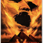 Movie poster for The Mummy. A ghoulish face appears above pyramids in the desert.